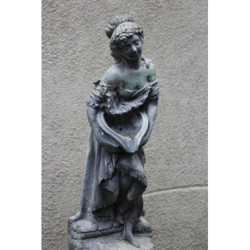 751 - A CAST STONE FOUNTAIN modelled as an escallop shell surmounted by a semi clad maiden holding a water... 