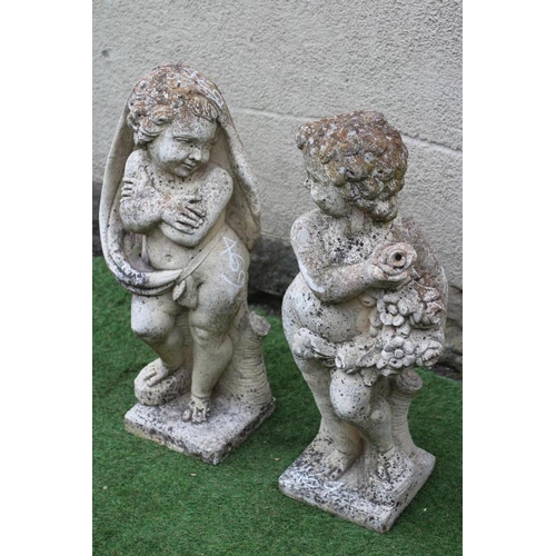 761 - A PAIR OF CAST STONE FIGURES allegorical of Winter and Summer, on square base, 33