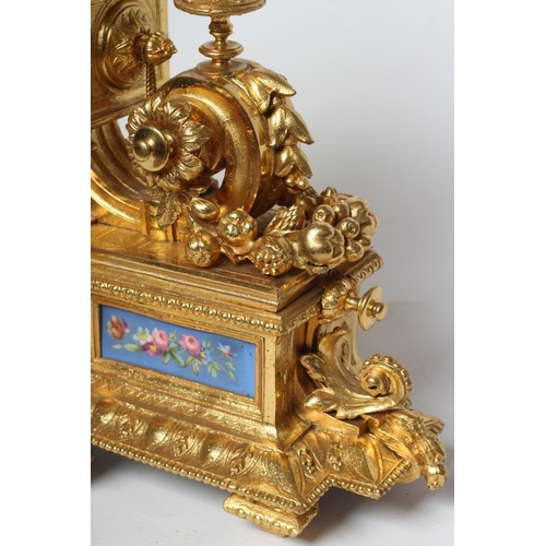 774 - A LOUIS XVI STYLE GILT METAL MANTEL CLOCK, late 19th century, inset with Sevres style bleu celeste p... 