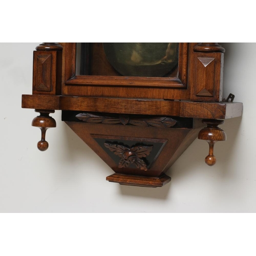 786 - A WALNUT VIENNA TYPE WALL CLOCK, c.1890, the triple weight driven movement striking on gongs, 6 1/4