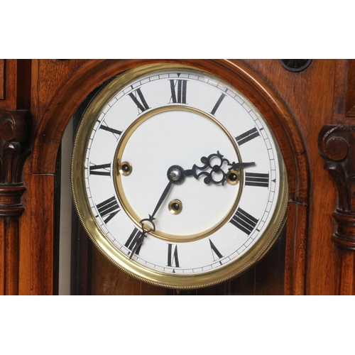 786 - A WALNUT VIENNA TYPE WALL CLOCK, c.1890, the triple weight driven movement striking on gongs, 6 1/4