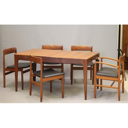 814 - AN  AFRORMOSA TEAK DINING TABLE AND CHAIRS by A Younger, mid 20th century, the extending oblong tabl... 