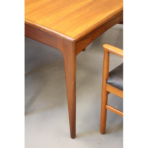 814 - AN  AFRORMOSA TEAK DINING TABLE AND CHAIRS by A Younger, mid 20th century, the extending oblong tabl... 