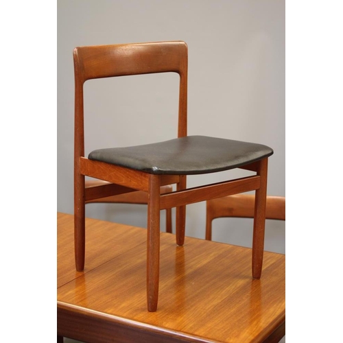 814 - AN  AFRORMOSA TEAK DINING TABLE AND CHAIRS by A Younger, mid 20th century, the extending oblong tabl... 