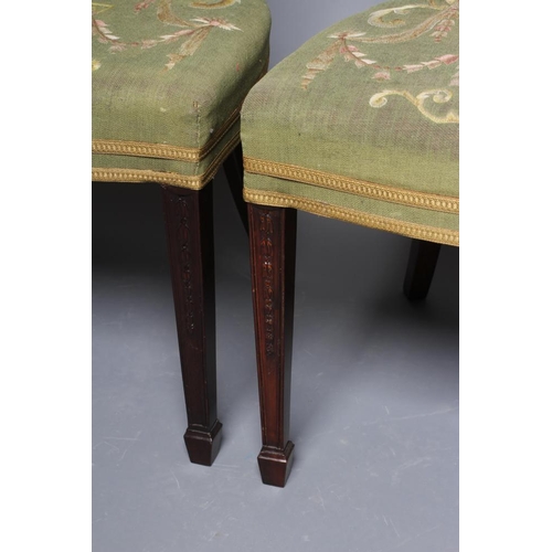 827 - A SET OF SIX MAHOGANY DINING CHAIRS, of Georgian design c.1900, the shield back with carved urn spla... 