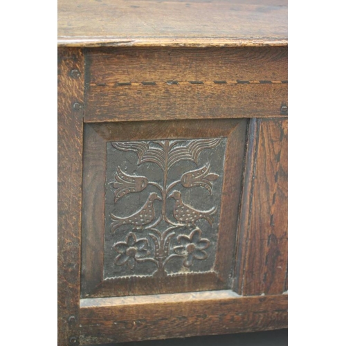 841 - AN OAK PANELLED COFFER, early 18th century, the moulded edged plank lid opening to interior with she... 