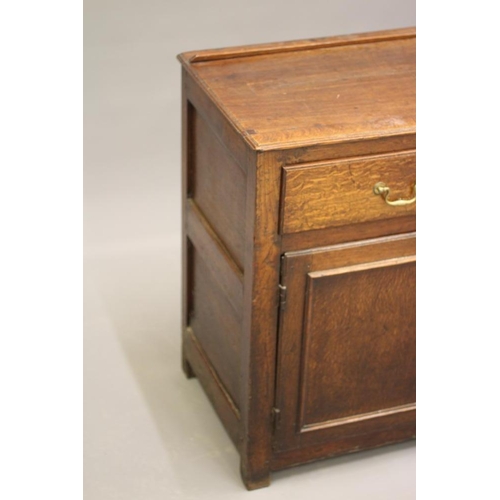 845 - AN OAK ENCLOSED DRESSER, early 19th century, the moulded edged top with rear plate stay, the fascia ... 