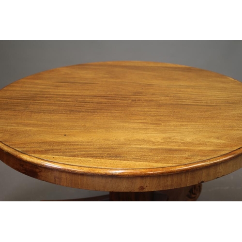 855 - A VICTORIAN MAHOGANY CENTRE TABLE, the moulded edged circular tilt top on triangular stem concave pl... 