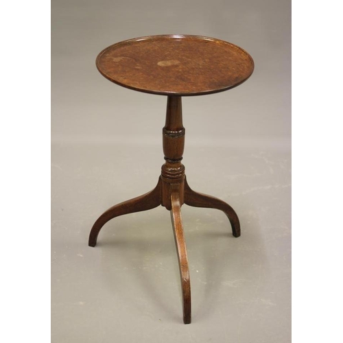 856 - A GEORGIAN MAHOGANY WINE TABLE, c.1800, the dished circular top on turned vase stem, raised on tripo... 