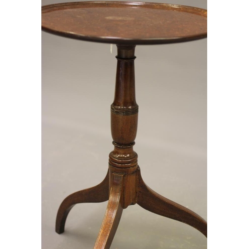 856 - A GEORGIAN MAHOGANY WINE TABLE, c.1800, the dished circular top on turned vase stem, raised on tripo... 