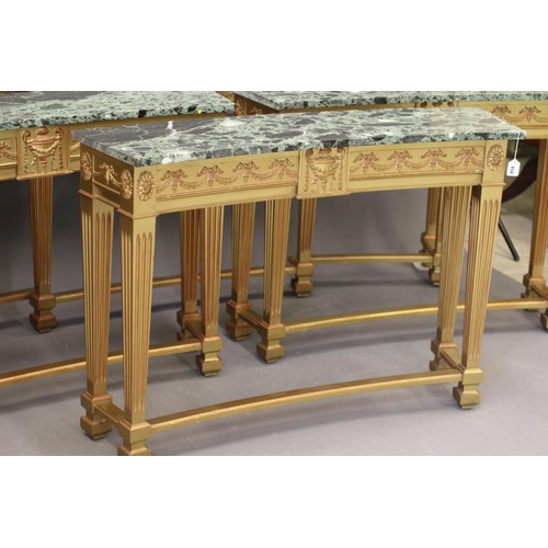 858 - A SUITE OF GILTWOOD AND GREEN MARBLE SIDE TABLES, modern, of curved outline and in the neo classical... 