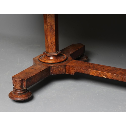 863 - AN EARLY VICTORIAN BURR OAK LIBRARY TABLE, the rounded oblong top over frieze drawer flanked on eith... 