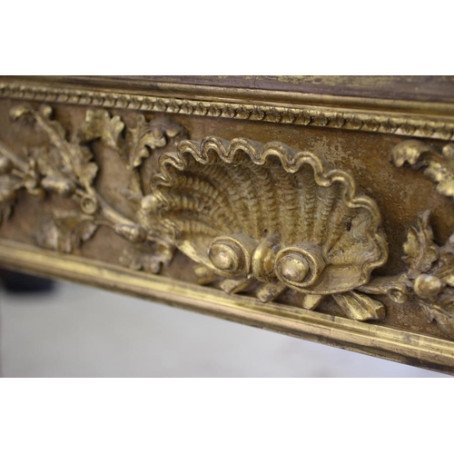 865 - A REGENCY GILT GESSO OVERMANTEL, early 19th century, of oblong inverted breakfront form, the cavetto... 