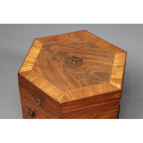 866 - A MAHOGANY CELLARETTE, 19th century, of hexagonal form crossbanded with chequer stringing, brass loo... 