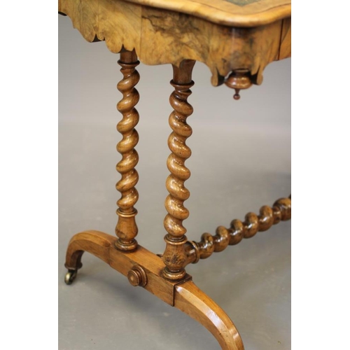 869 - A VICTORIAN WALNUT LIBRARY TABLE, the moulded edged serpentine top inset with green leather, waved f... 