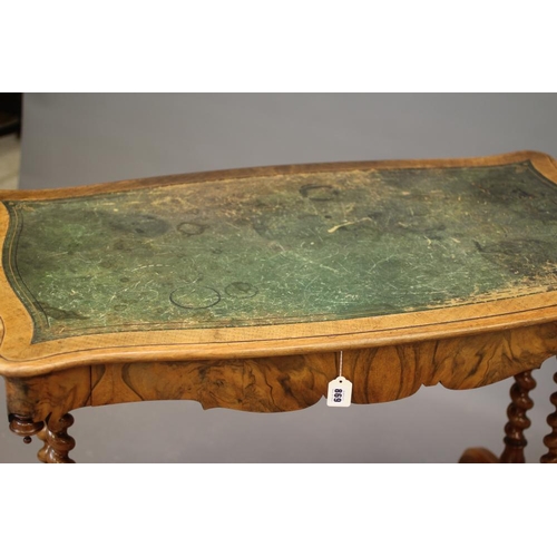 869 - A VICTORIAN WALNUT LIBRARY TABLE, the moulded edged serpentine top inset with green leather, waved f... 