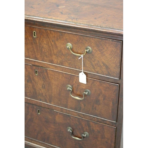 870 - A POLLARD OAK VENEERED CHEST, the moulded edged and banded top with stringing, three long drawers wi... 