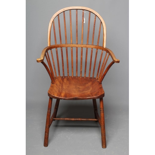 872 - A HIGH HOOP BACK WINDSOR ARMCHAIR, late 19th century (?), in beech, ash and elm, with spindle back, ... 