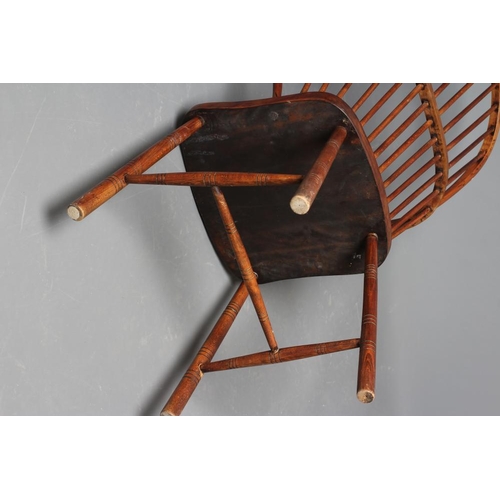 872 - A HIGH HOOP BACK WINDSOR ARMCHAIR, late 19th century (?), in beech, ash and elm, with spindle back, ... 