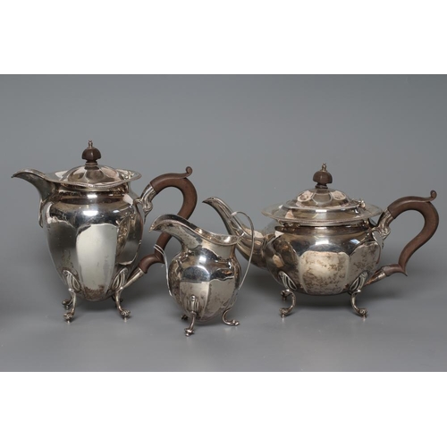 101 - A SILVER PART TEA AND COFFEE SERVICE, maker Fattorini & Sons, Sheffield 1922, of octagonal conical f... 