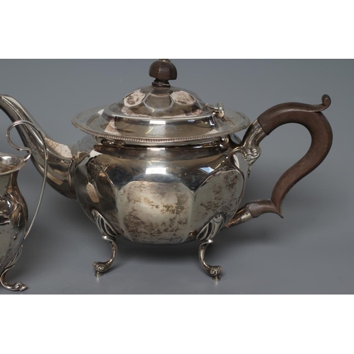 101 - A SILVER PART TEA AND COFFEE SERVICE, maker Fattorini & Sons, Sheffield 1922, of octagonal conical f... 