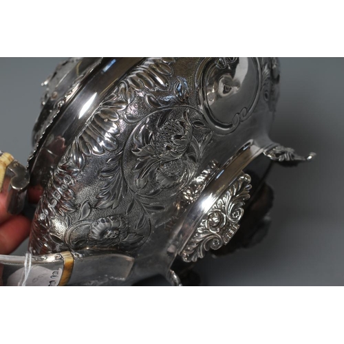 111 - A GEORGE IV SILVER TEAPOT, maker's mark GH, London 1828, of squat globular form chased with a band o... 