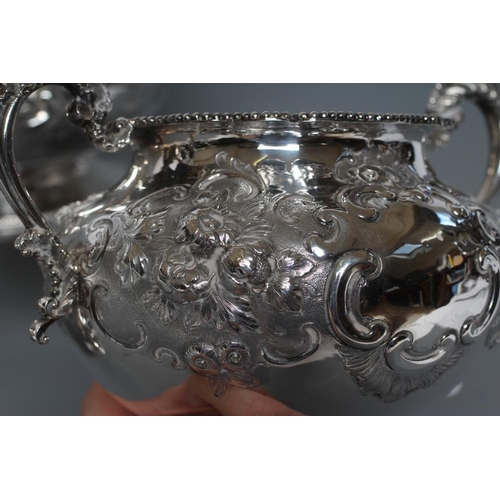 114 - A VICTORIAN SILVER FOUR PIECE TEA AND COFFEE SERVICE, maker Hands & Son, London 1863, of baluster fo... 