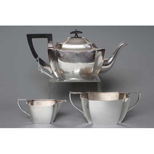 121 - AN EDWARDIAN SILVER THREE PIECE TEA SERVICE, maker R & W Sorley, Sheffield 1897, of oblong form with... 