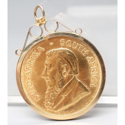 142 - A KRUGERRAND, 1982, in a 9ct gold loose pendant mount, London 1992, 37.2g total (Est. plus 24% premi... 