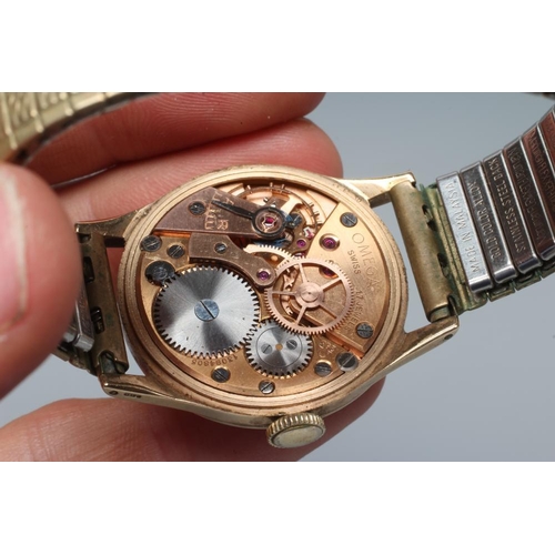 162 - A GENTLEMAN'S 9CT GOLD OMEGA WRISTWATCH, the champagne dial with gilt metal Arabic quarter numerals ... 