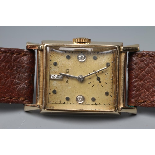 164 - A GENTLEMAN'S LONGINES WRISTWATCH, the oblong dark champagne dial with three small channel set diamo... 