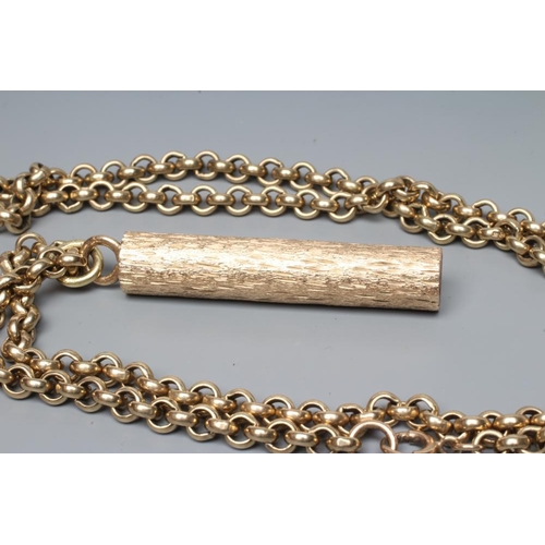 170 - A 9CT GOLD PENDANT, sponsor's mark ZJ, Sheffield 1977, of cylindrical form with brushed bark effect ... 