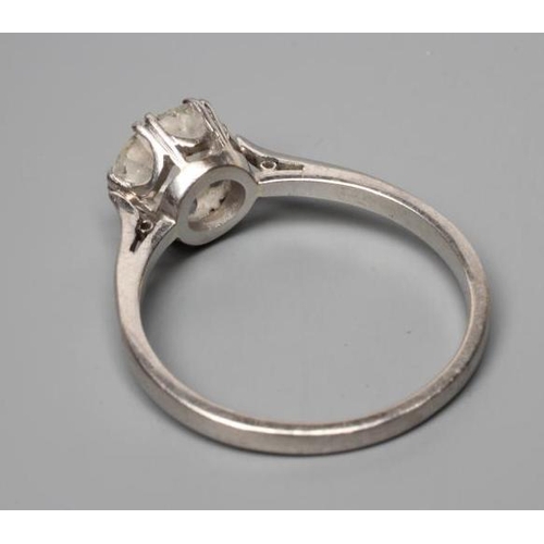 176 - A SOLITAIRE DIAMOND RING, the brilliant cut stone of approximately 1.50cts claw set to a plain, unma... 