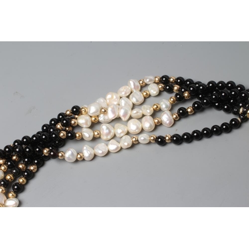 179 - AN ONYX BEAD AND FRESHWATER PEARL FIVE STRAND NECKLACE to a reeded clasp stamped 750, EJ (Est. plus ... 