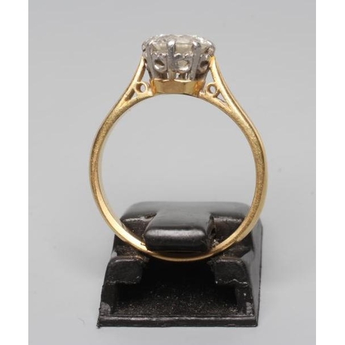 180 - A SOLITAIRE DIAMOND RING, the round brilliant cut stone of approximately 1ct, claw set to a plain sh... 