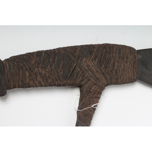 478 - A LARGE PAPUA NEW GUINEA HAGAN AXE with stone head, painted and carved rear head, wrappings and tape... 