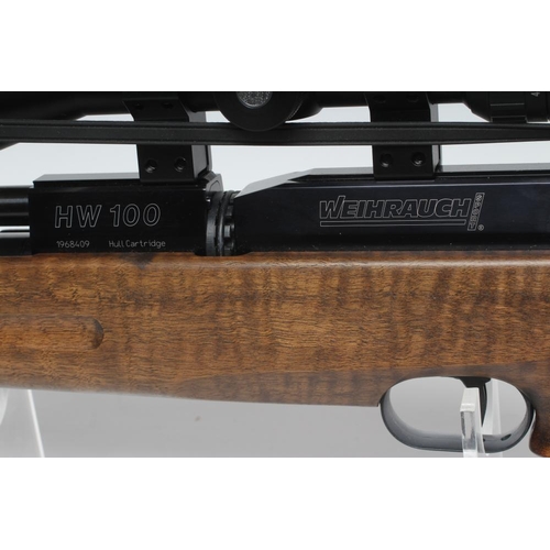 480 - A WEIHRAUCH HW100 .177 PCP AIR RIFLE, the barrel with supressor, 14 shot rotating magazine, thumbhol... 