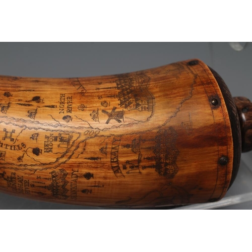 507 - A HORN POWDER FLASK, scrimshaw style, with turned spout, wood plugged butt and body etched with Roya... 