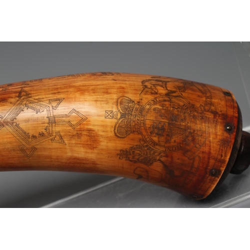 507 - A HORN POWDER FLASK, scrimshaw style, with turned spout, wood plugged butt and body etched with Roya... 