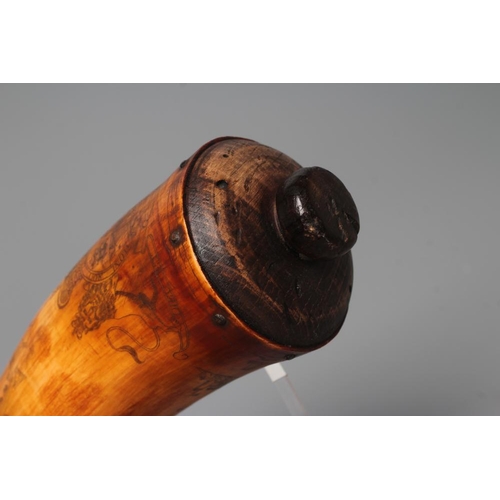 507 - A HORN POWDER FLASK, scrimshaw style, with turned spout, wood plugged butt and body etched with Roya... 