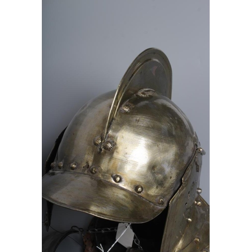 580 - A REPRODUCTION BURGONET HELMET with high medial ridge, rounded peak, neck and ear guards, together w... 