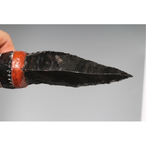 585 - AN OBSIDIAN DAGGER, from Papua New Guinea, with 4 5/8