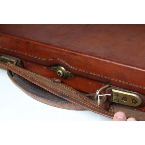 600 - A JAMES PURDEY & SONS DOUBLE SHOTGUN CASE of oak and leather construction, red internal baize, conta... 