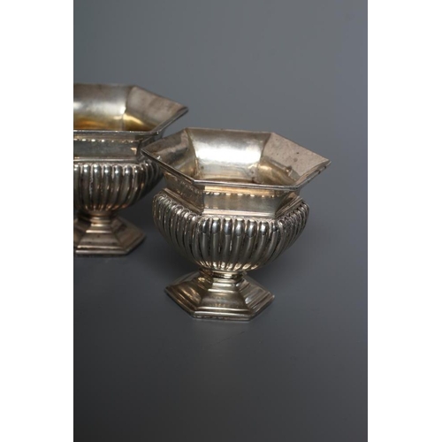 98 - A SILVER FIVE PIECE CRUET, maker Goldsmiths & Silversmiths Ltd., London 1928, of semi-fluted hexagon... 