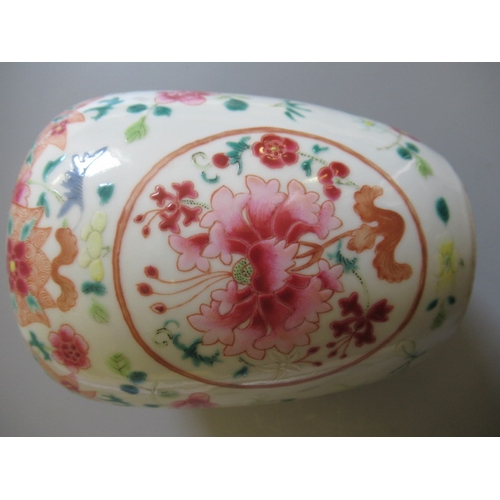 9 - A CHINESE PORCELAIN FAMILLE ROSE JAR of ovoid form painted with roundels of peonies on a scattered f... 