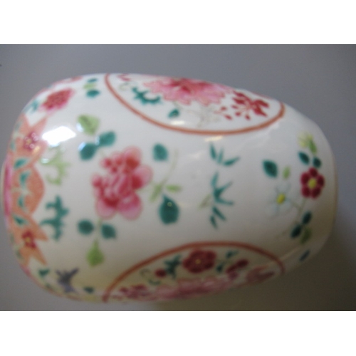 9 - A CHINESE PORCELAIN FAMILLE ROSE JAR of ovoid form painted with roundels of peonies on a scattered f... 