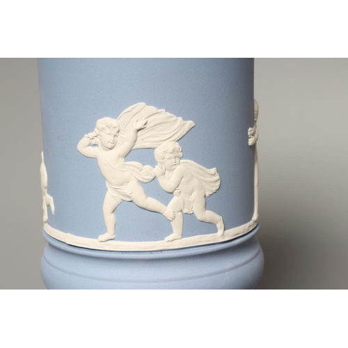 54 - A WEDGWOOD BLUE JASPERWARE PEDESTAL VASE AND COVER, modern, of cylindrical form, moulded and applied... 