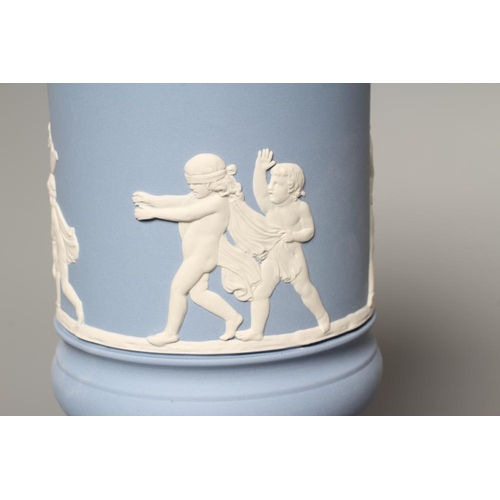 54 - A WEDGWOOD BLUE JASPERWARE PEDESTAL VASE AND COVER, modern, of cylindrical form, moulded and applied... 