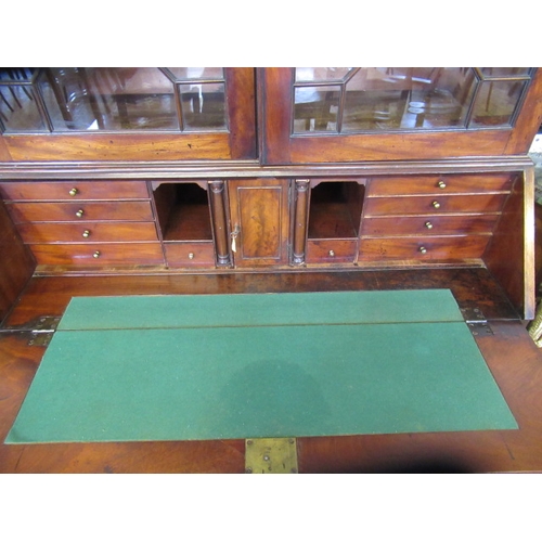 857 - A GEORGIAN MAHOGANY BUREAU BOOKCASE, third quarter 18th century, the moulded cornice with broken ped... 