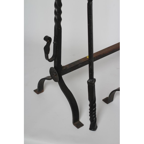 404 - AN EARLY GEORGIAN STYLE CAST IRON FIREBACK, 19th century, of oblong form with arched crest over the ... 